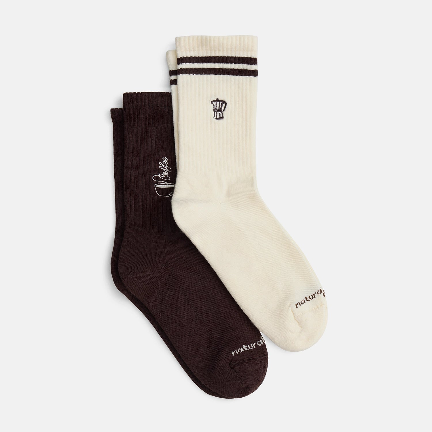 Coffee Tennissocken-Set it einem Paar dunkelbraunen Coffee Tennissocken und einem Paar naturweißen Moka Express Tennissocken.